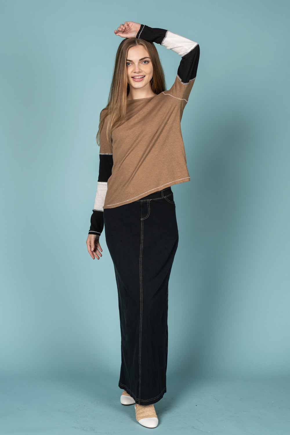 Tan Top With Black And White Striped Sleeves