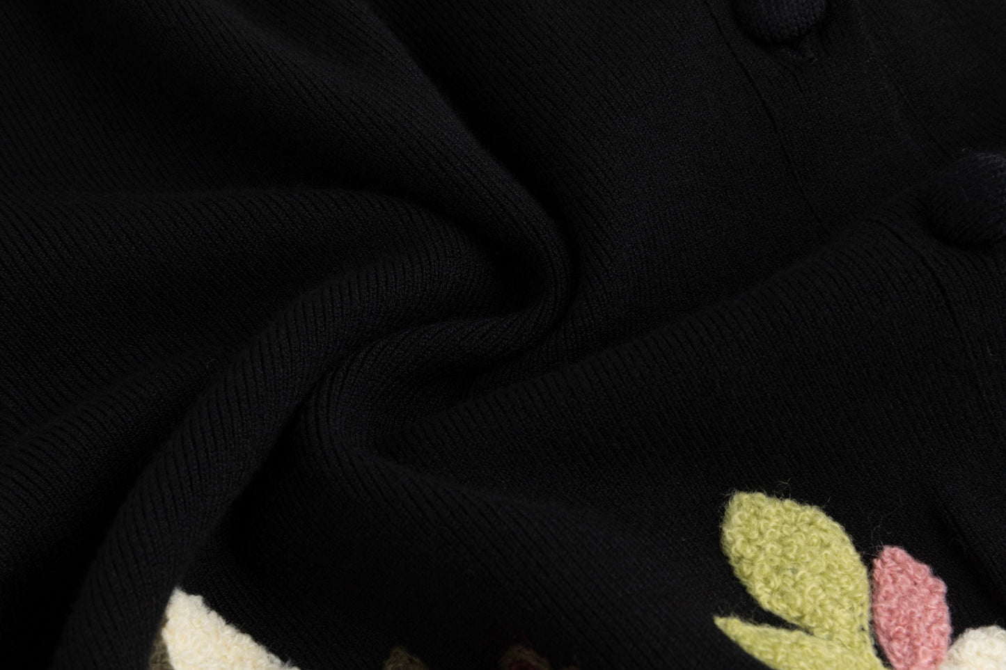 Black Knit With Orange Fuzzy Floral Details