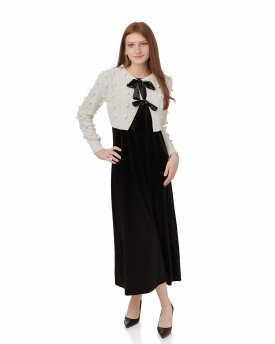 Black Velvet Dress With White Pom Pom Cardigan With Ribbon Ties Overlay