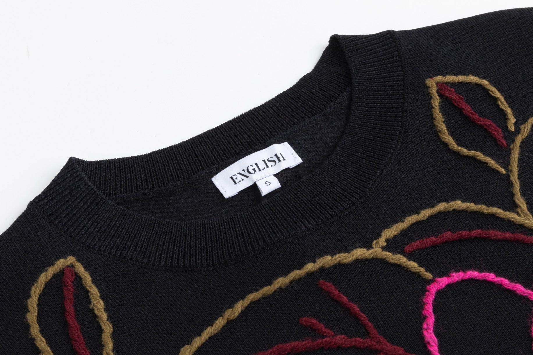 Black And Hot Pink Yarn Embroidered Knit Top