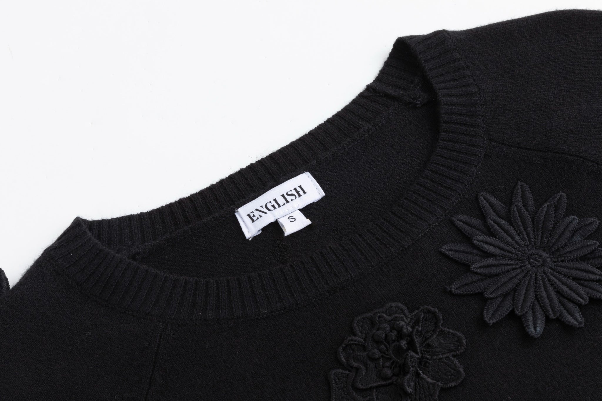 Black Knit With 3D Floral Details