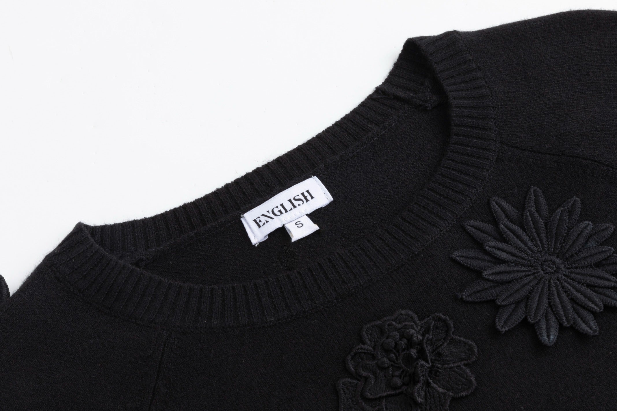 Black Knit With 3D Floral Details