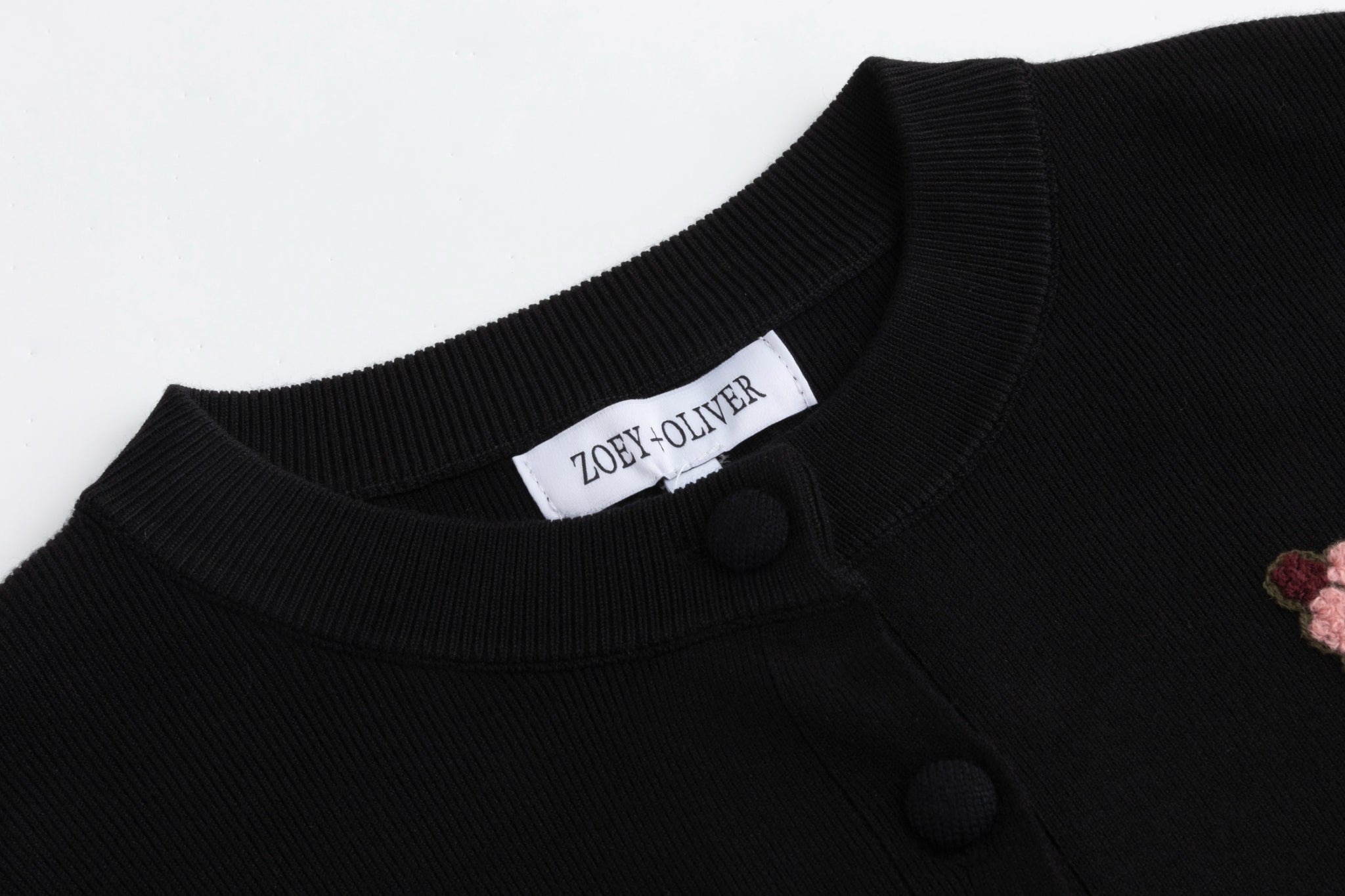 Black Knit With Orange Fuzzy Floral Details