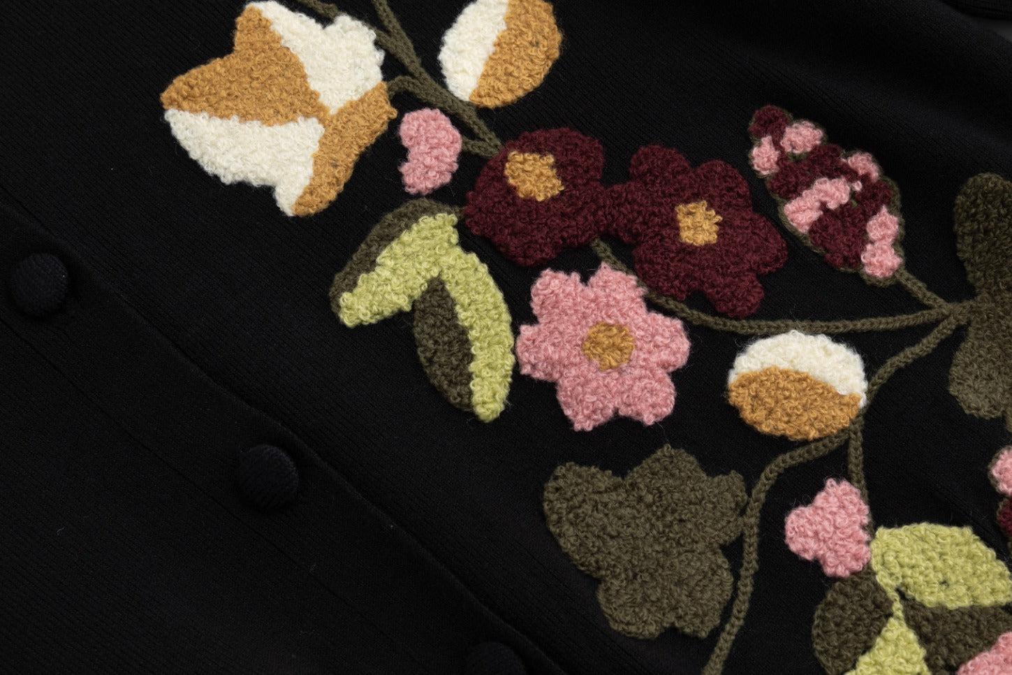 Black Knit With Orange Fuzzy Floral Details