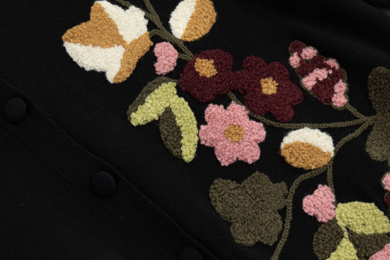 Black Knit With Orange Fuzzy Floral Details