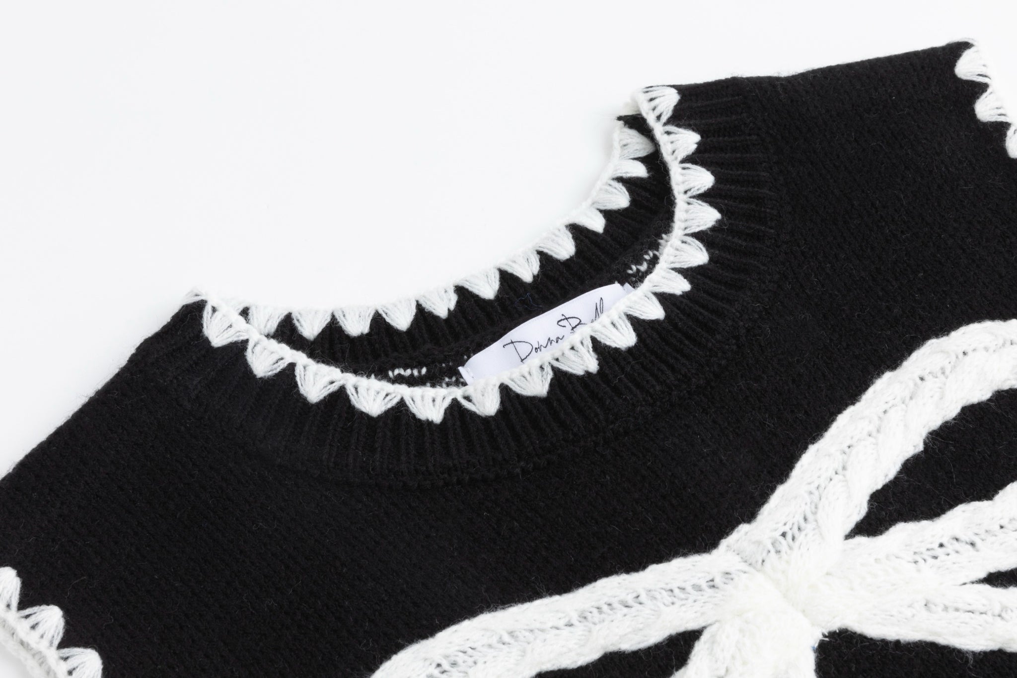 Black Knit Vest With White Embroidered Bow