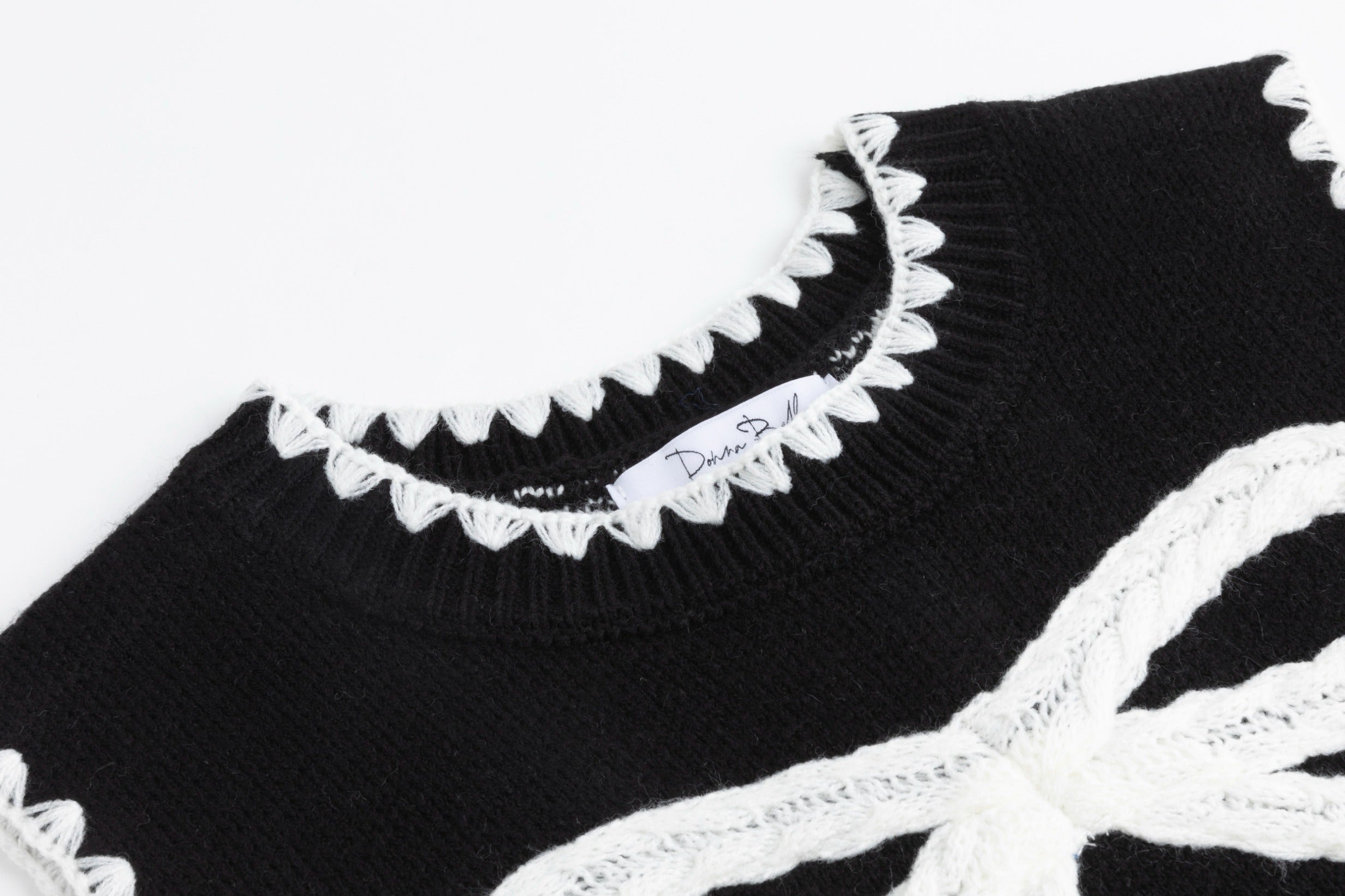 Black Knit Vest With White Embroidered Bow