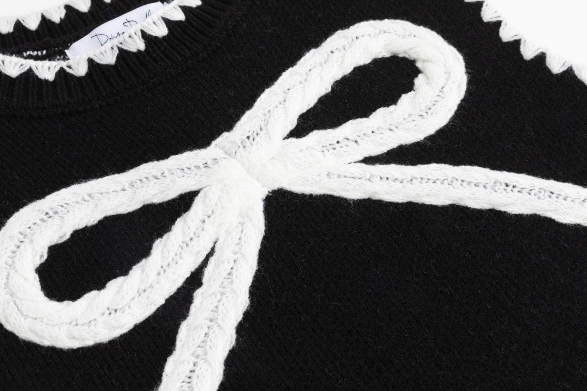 Black Knit Vest With White Embroidered Bow