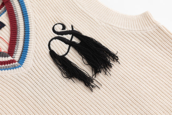 Off White Knit Vest With Colored Striped Ribbing