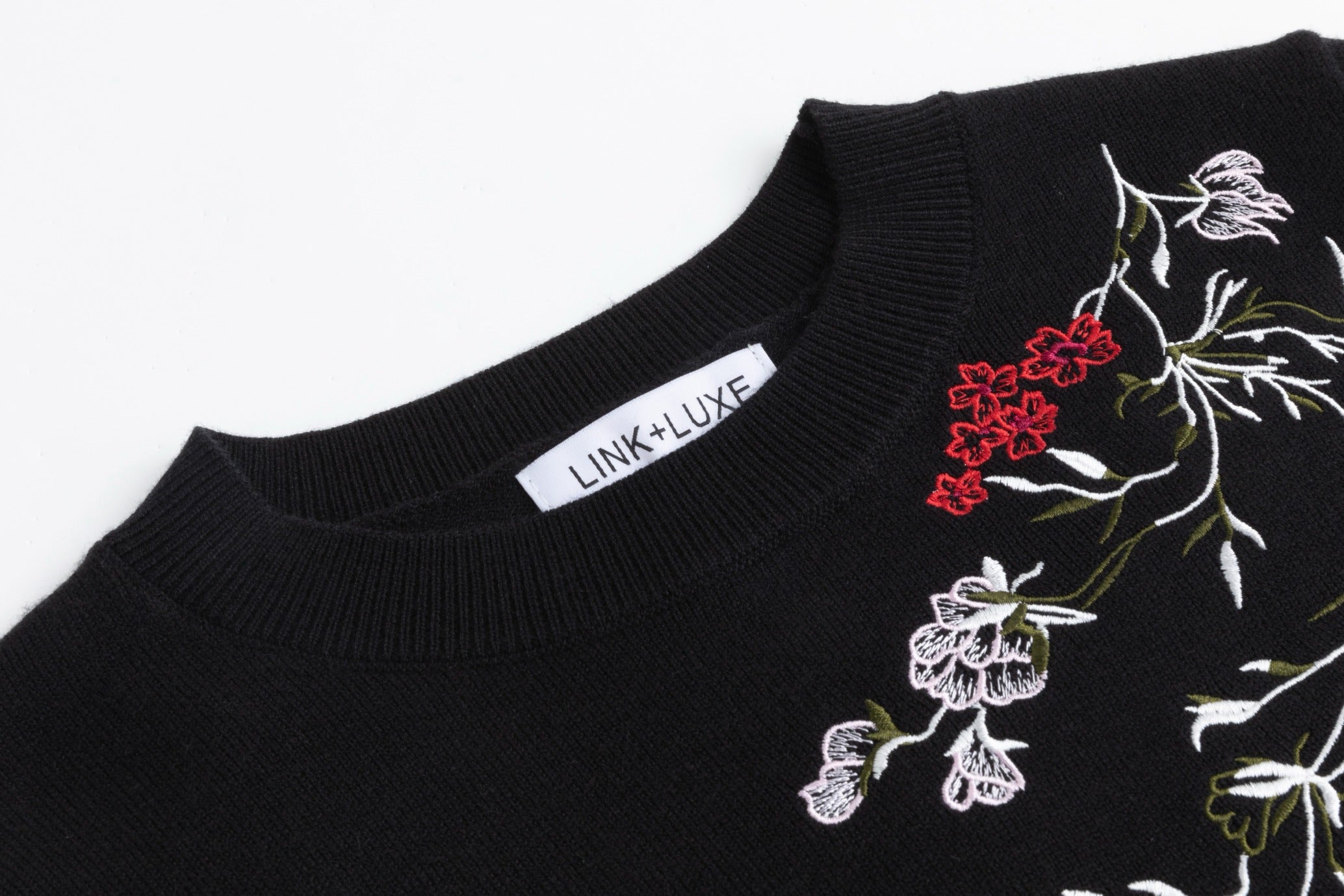 Black Knit Top With Red Embroidered Floral Print