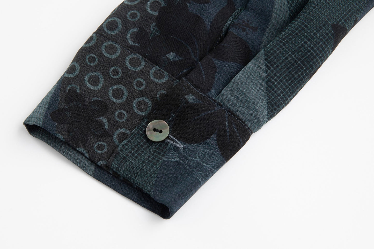 Teal And Black Printed Overlay Dress
