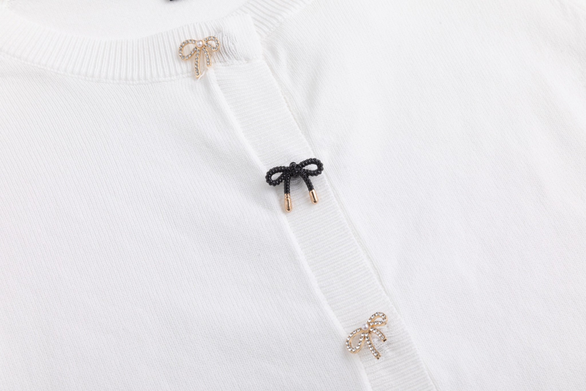 White Cardigan With Bow Shaped Buttons