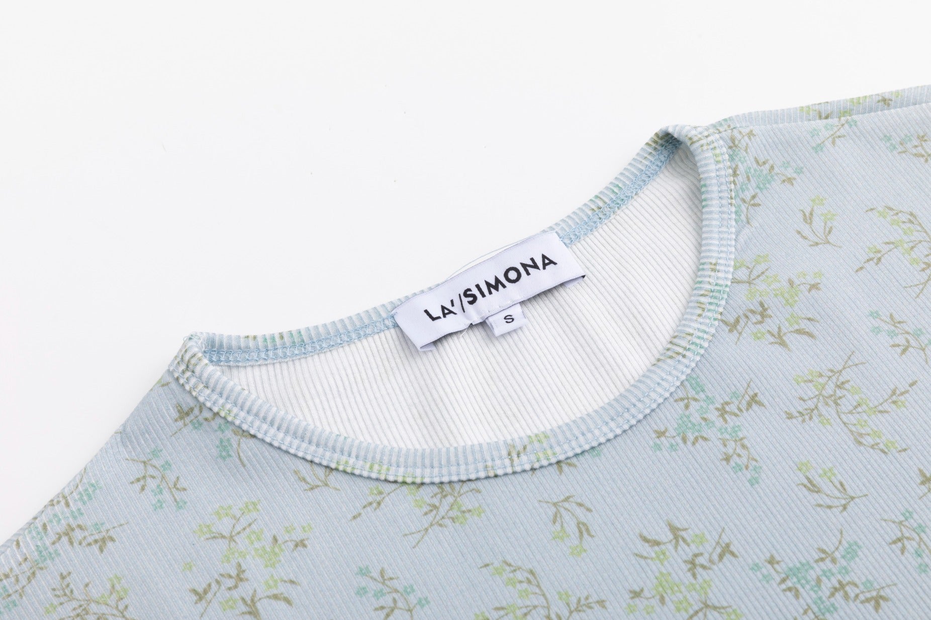 Light Blue Leaves Print Ivory Base Top