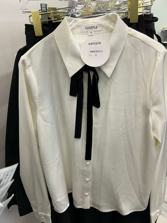 White Blouse With Black Neck Tie