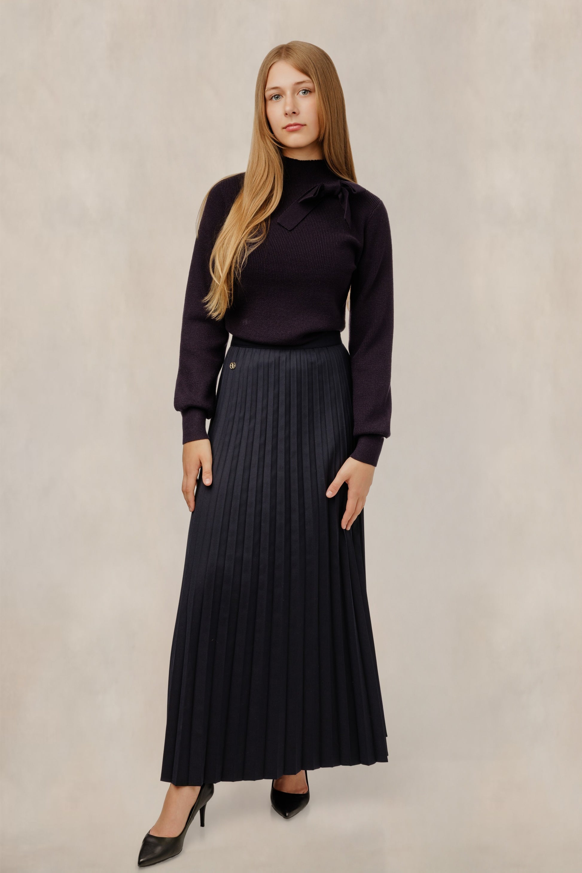Navy Satin Pleated Skirt With Silver Emblem