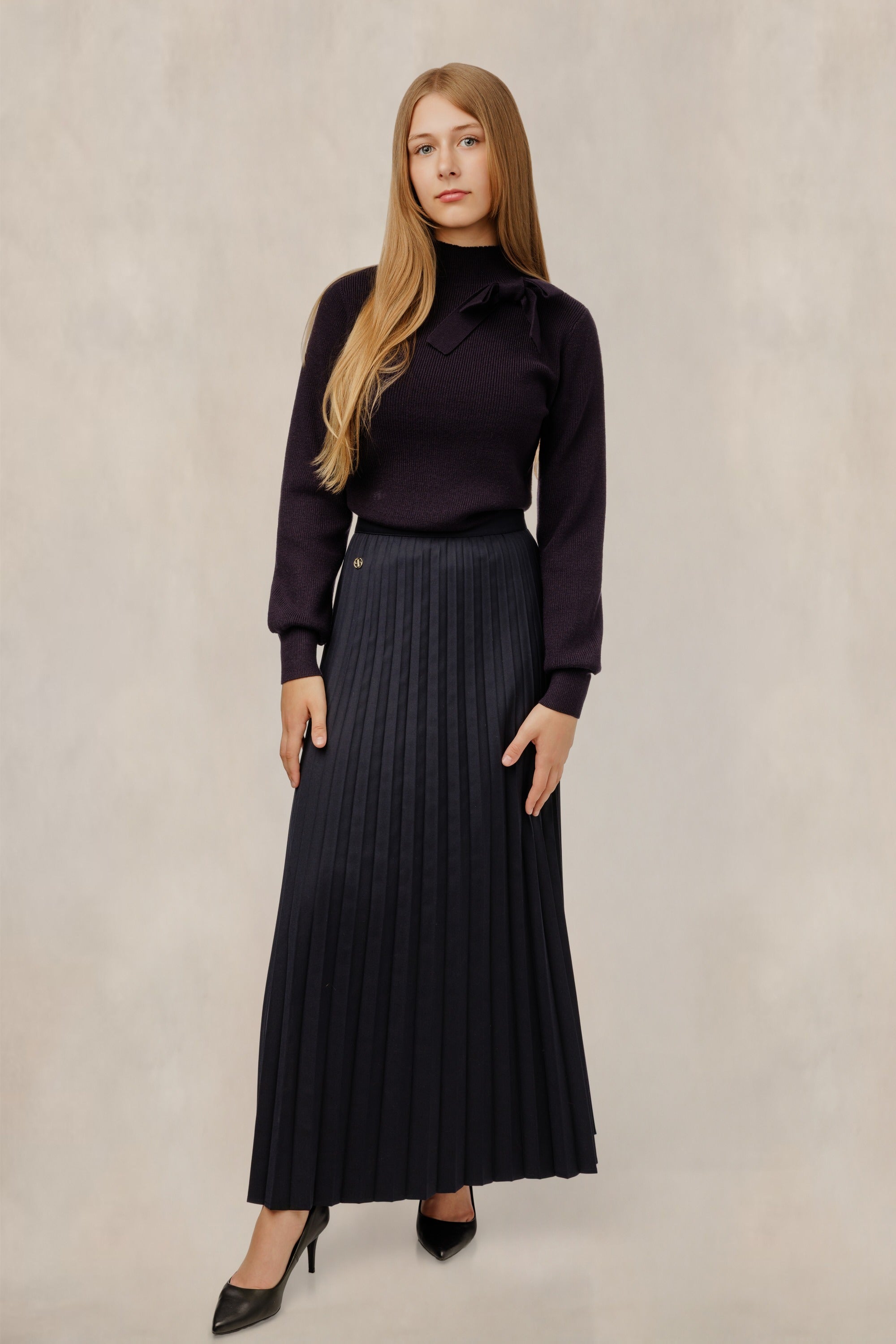 Navy Satin Pleated Skirt With Silver Emblem
