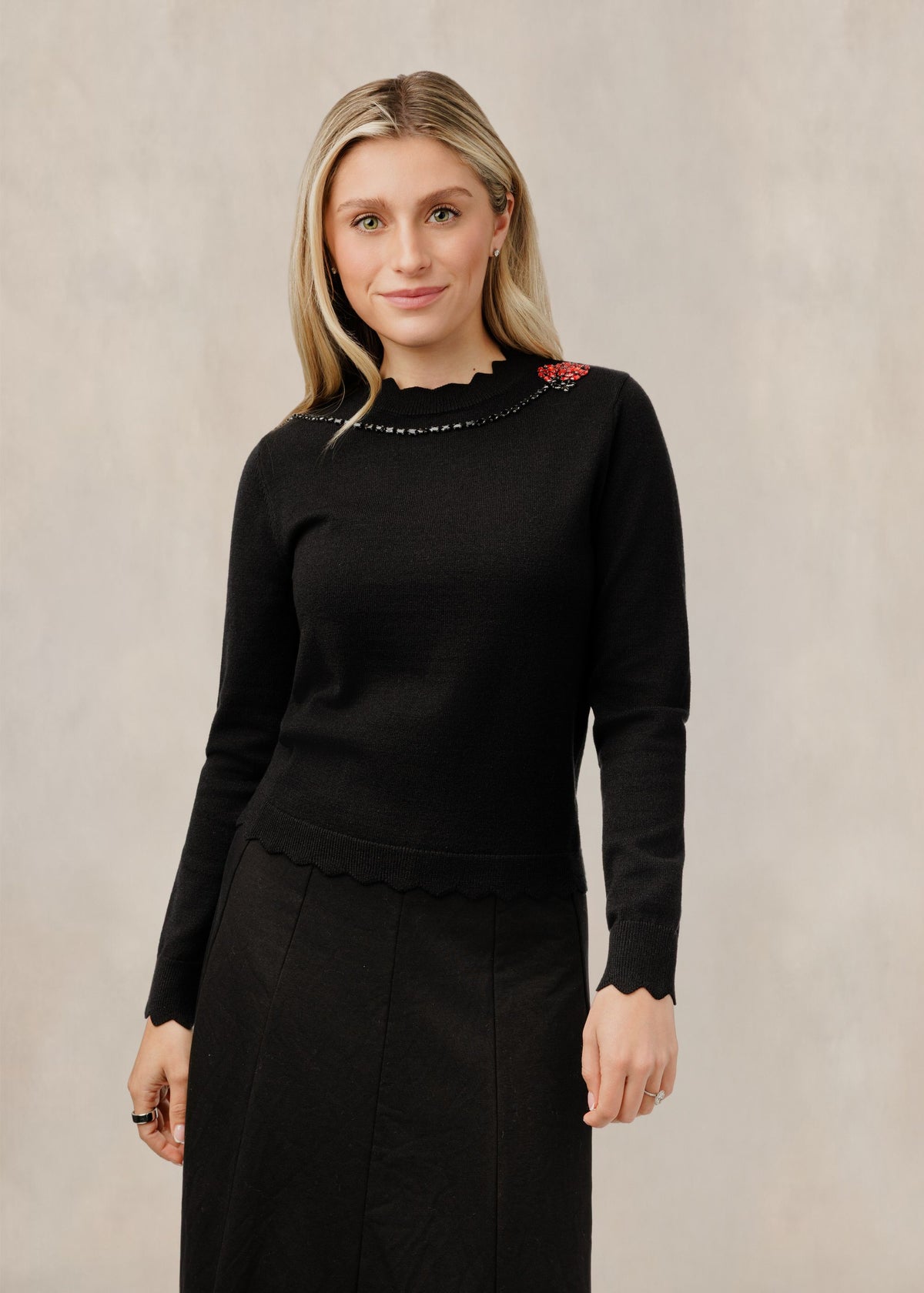 Black Knit Sweater With Flower Gem Design